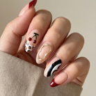 Hand with stylish nail art on a neutral background
